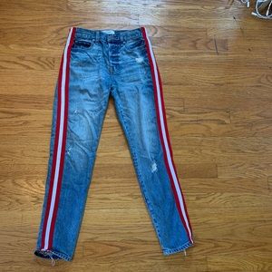 Blue jeans with red strip down side